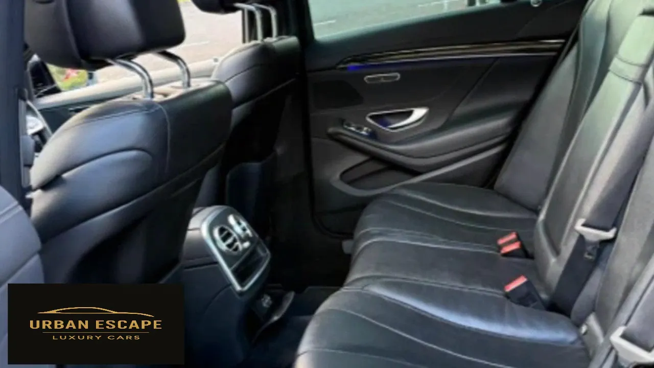 Mercedes-Benz S 350 black leather rear bench seat with rear air vents and blue ambient door lighting