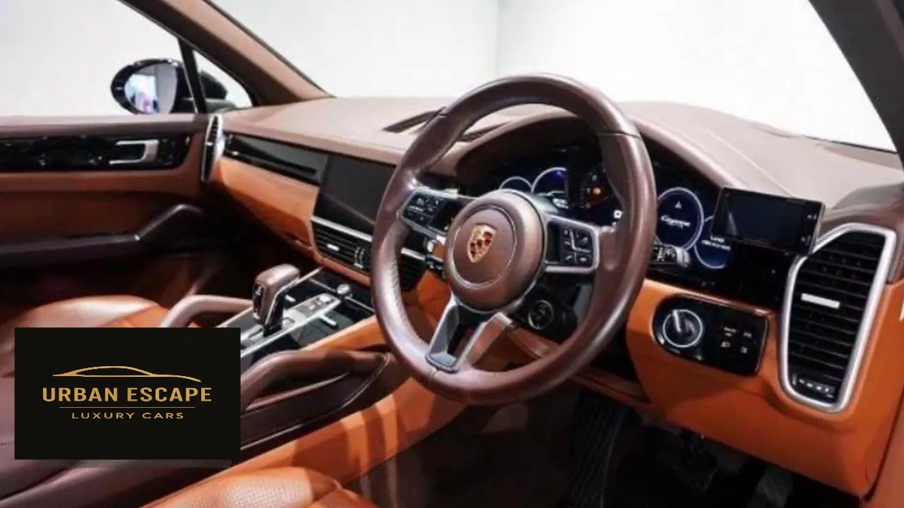 Porsche Cayenne brown and cognac leather dashboard with steering wheel and instrument display