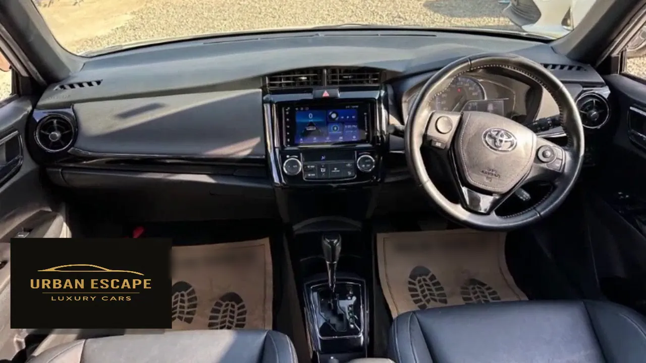 Toyota Corolla Fielder dashboard with touch screen, right-hand-drive steering wheel and automatic gear lever