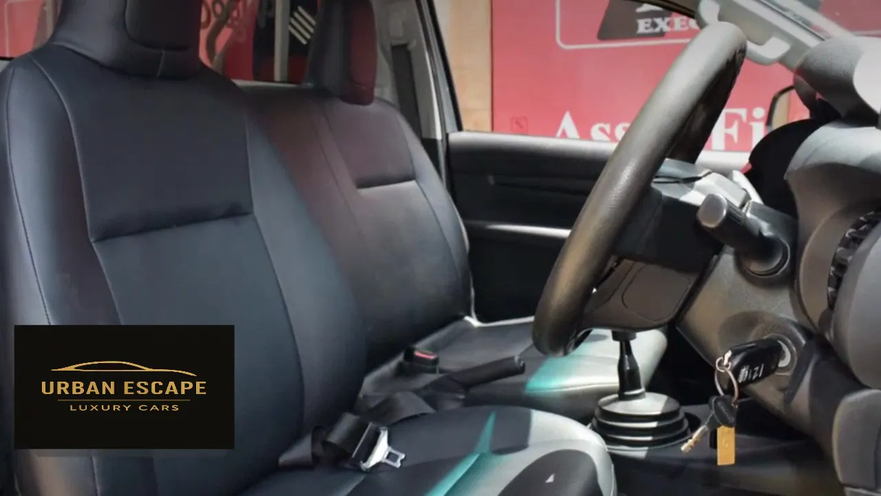 Toyota Hilux Single Cab interior with black front seats, steering wheel and gear lever