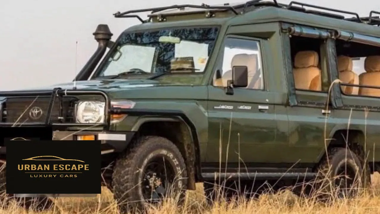 Toyota Land Cruiser Safari in olive green, front three-quarter view with snorkel, bull bar and roof rack
