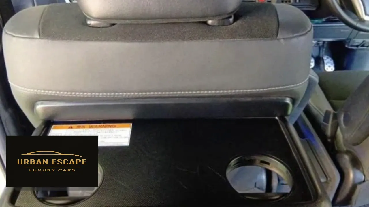 Toyota Noah fold-down table with two cup holders on the back of the front passenger seat